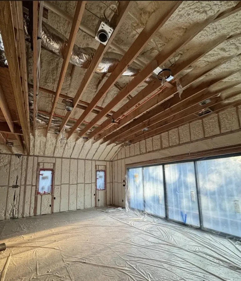 Interior walls and ceiling insulated with spray foam during new construction in New Lenox